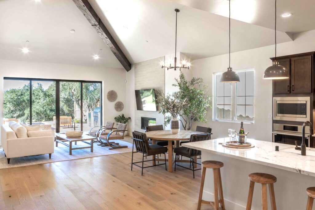 Modern spacious kitchen and living room interior design.