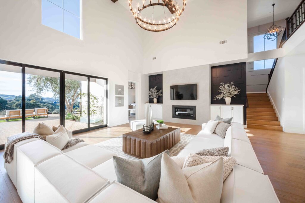Spacious modern living room with natural lighting and decor.